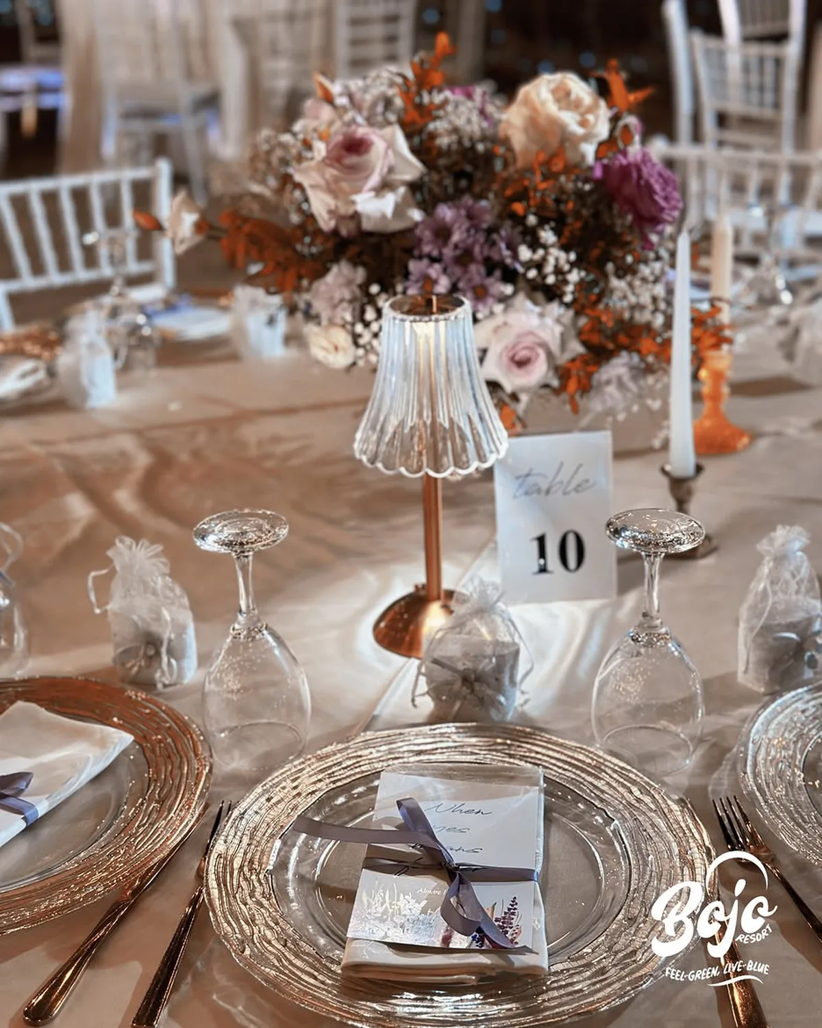 An evening celebration under string lights at BOJO Resort