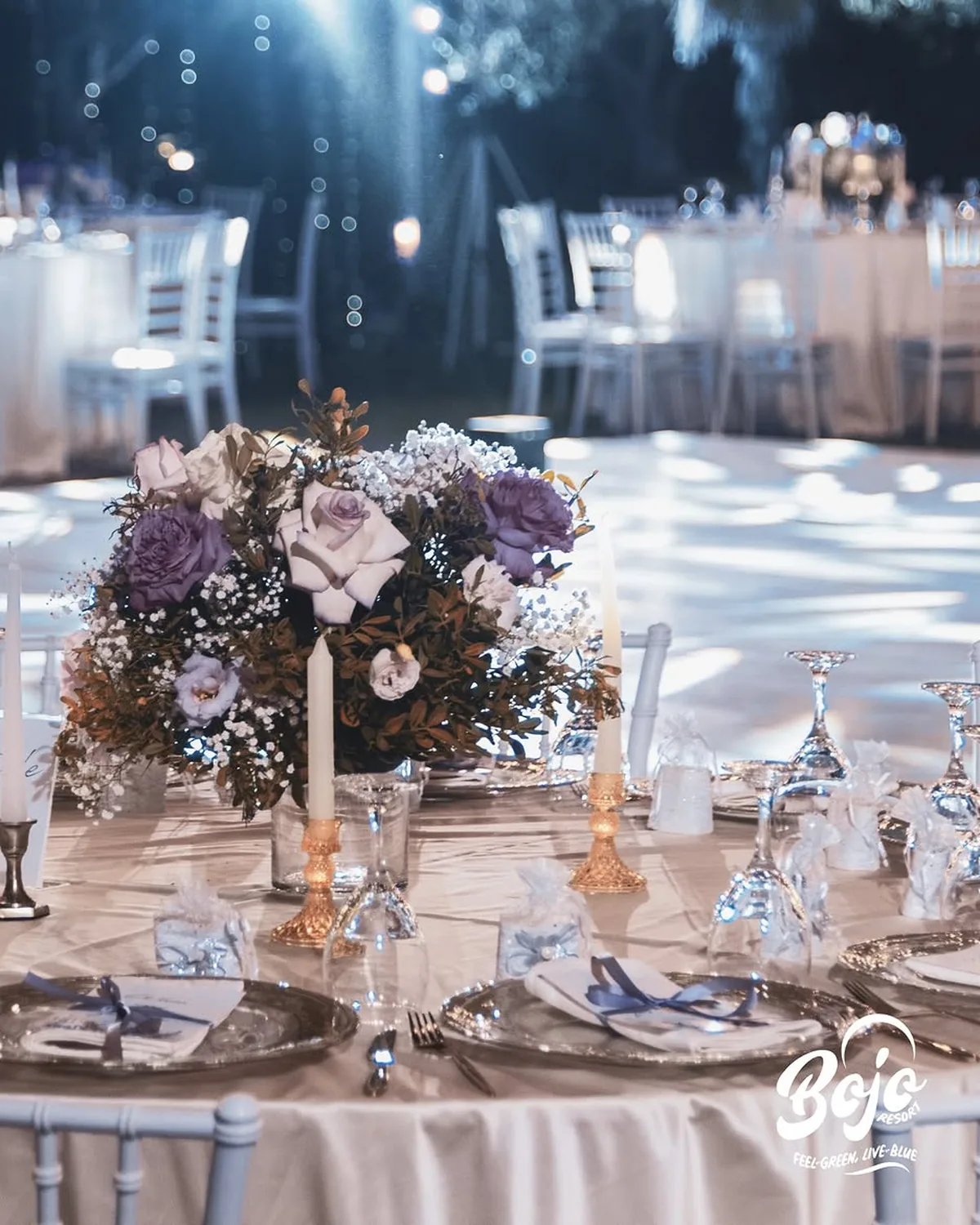 Wedding florals set by the sea at BOJO Resort, Radhimë